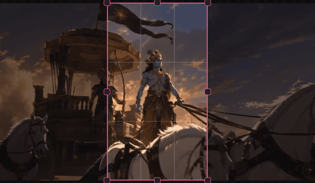 A 9:16 crop frame with corner handles and thirds guides over a video